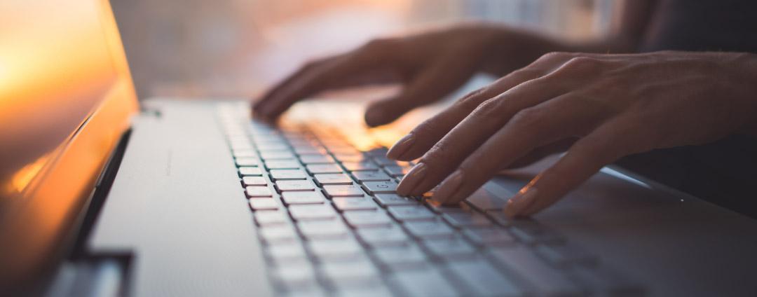 ThreatLabz Discovers 117 Vulnerabilities in Microsoft 365 Apps Via the SketchUp 3D Library - Part 1 A person typing at their computer