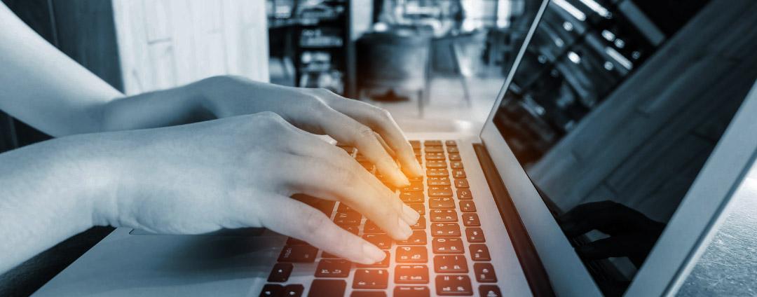 Coverage Advisory for CVE-2023-47246 SysAid Zero-Day Vulnerability A person typing at their computer