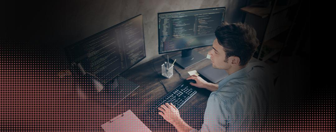 New ThreatLabz Report: Exploring Encrypted Attacks Amidst the AI Revolution A person at a computer working