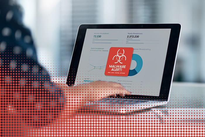 Coverage Advisory for CVE-2023-50164: Apache Struts Path Traversal and File Upload Vulnerability A person typing at their computer