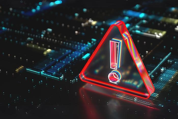 OpenSSH Vulnerabilities CVE-2024-6387 & CVE-2024-6409 Pose Significant Security Risk A red digital warning sign appearing above computer parts.