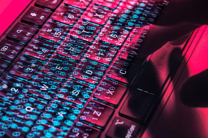 Zscaler Discovers Vulnerability in Keras Models Allowing Arbitrary File Access and SSRF (CVE-2025-12058) keyboard with data and code
