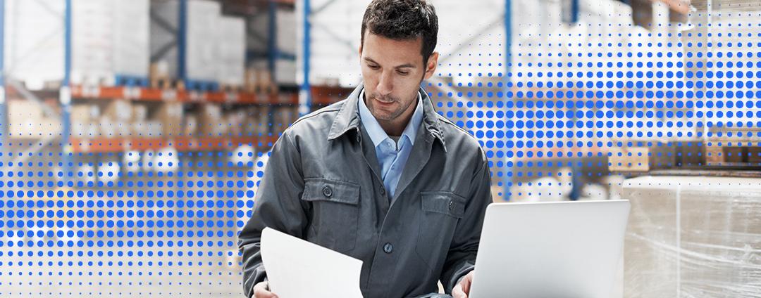 What the Enterprise Gains from a Zero Trust Architecture A person in a factory looking at a paper