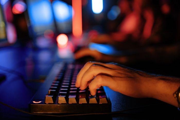 Latest Xloader Obfuscation Methods and Network Protocol A person typing at their computer